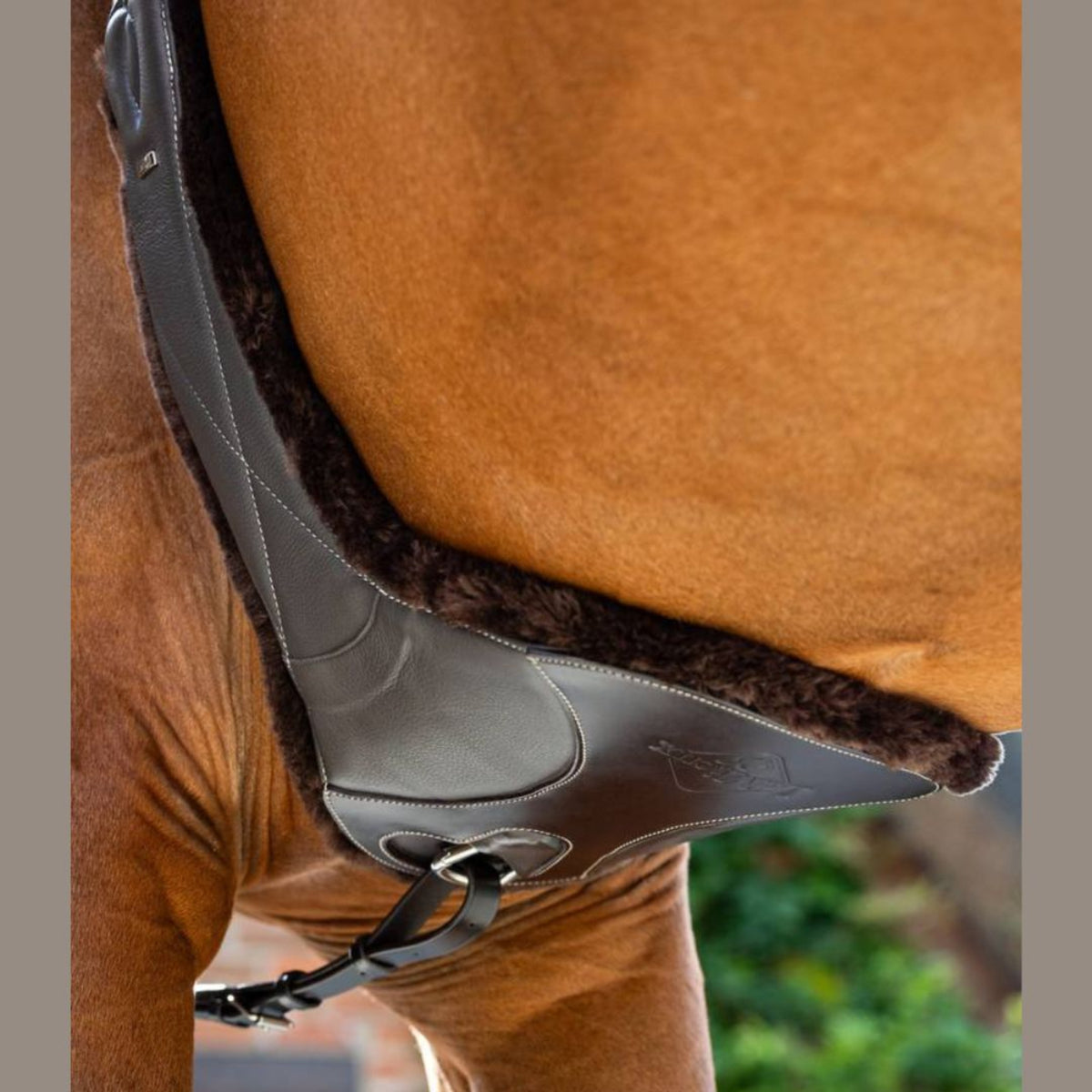 LeMieux Arika Simuwool Contoured Long Stud Girth - Brown | Malvern Saddlery