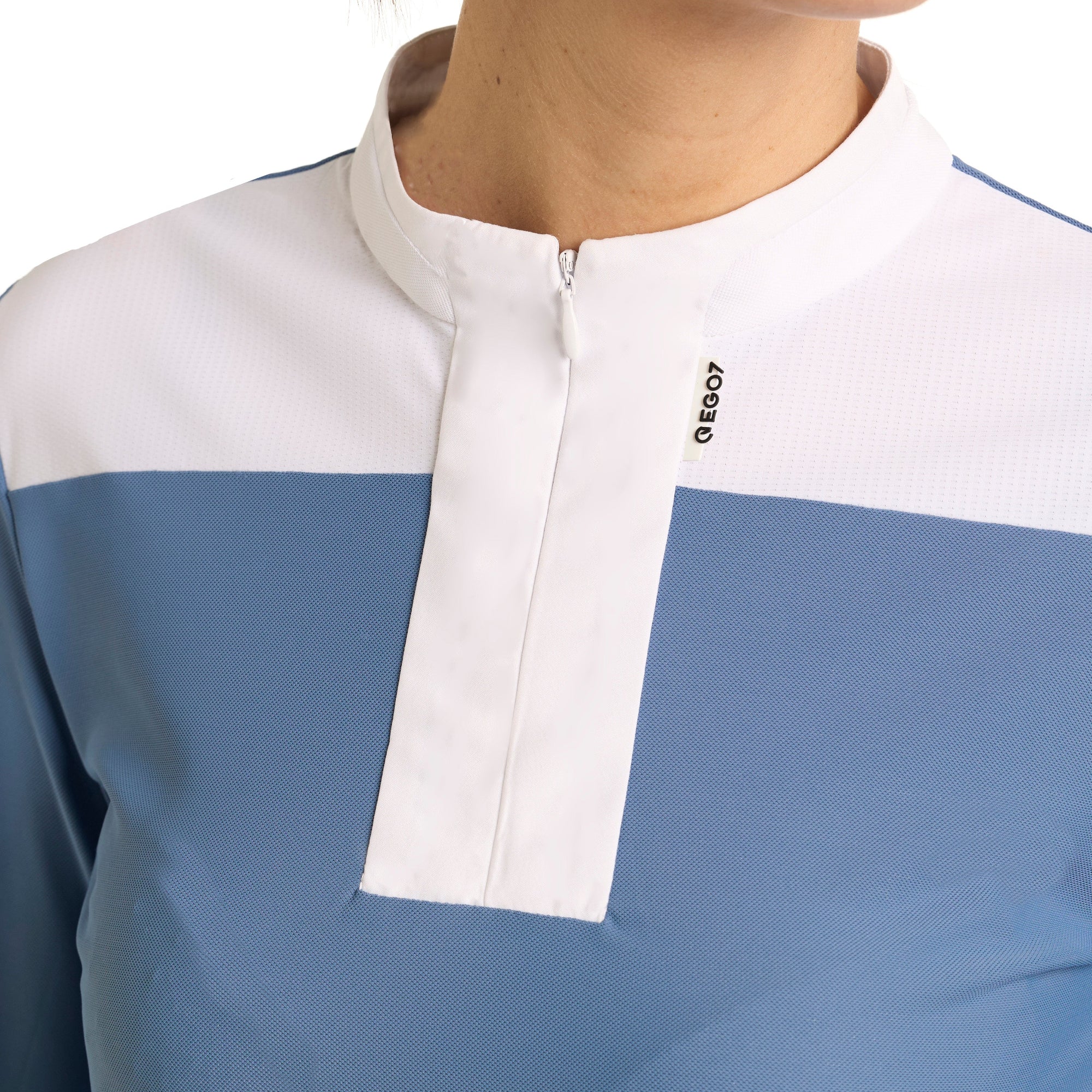 Close-up of the EGO7 Carmen Colony Blue competition shirt collar and concealed zipper
