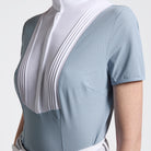 Cavalleria Toscana Women's Competition Shirt in Technical Jersey with white poplin colllar & hidden buttons - light blue, shown on model close up of torso | Equestrian Show Shirts  | Malvern Saddlery
