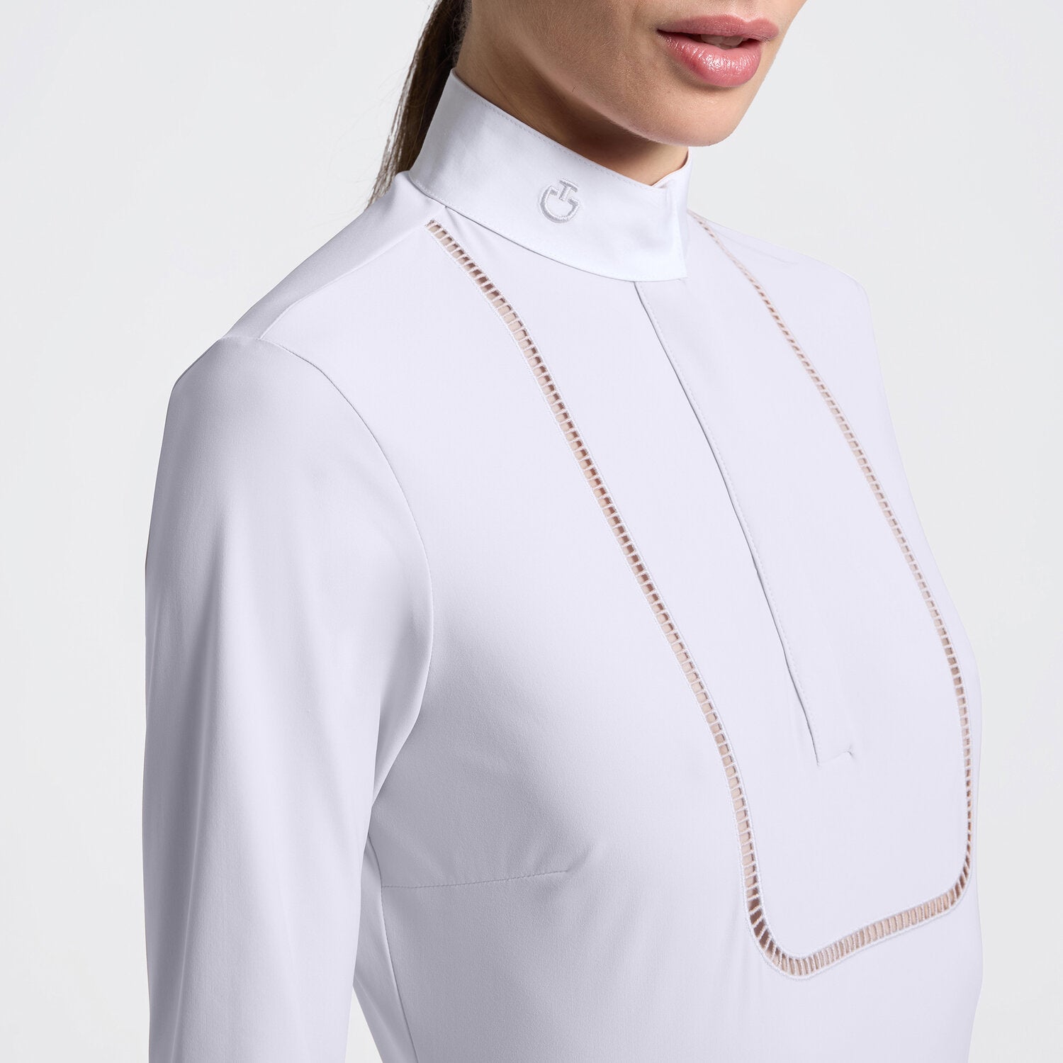 Cavalleria Toscana Women's Long Sleeve Riding Shirt with Embroidery - White; close up shown on model; light gray background | Equestrian Show Shirts | Malvern Saddlery