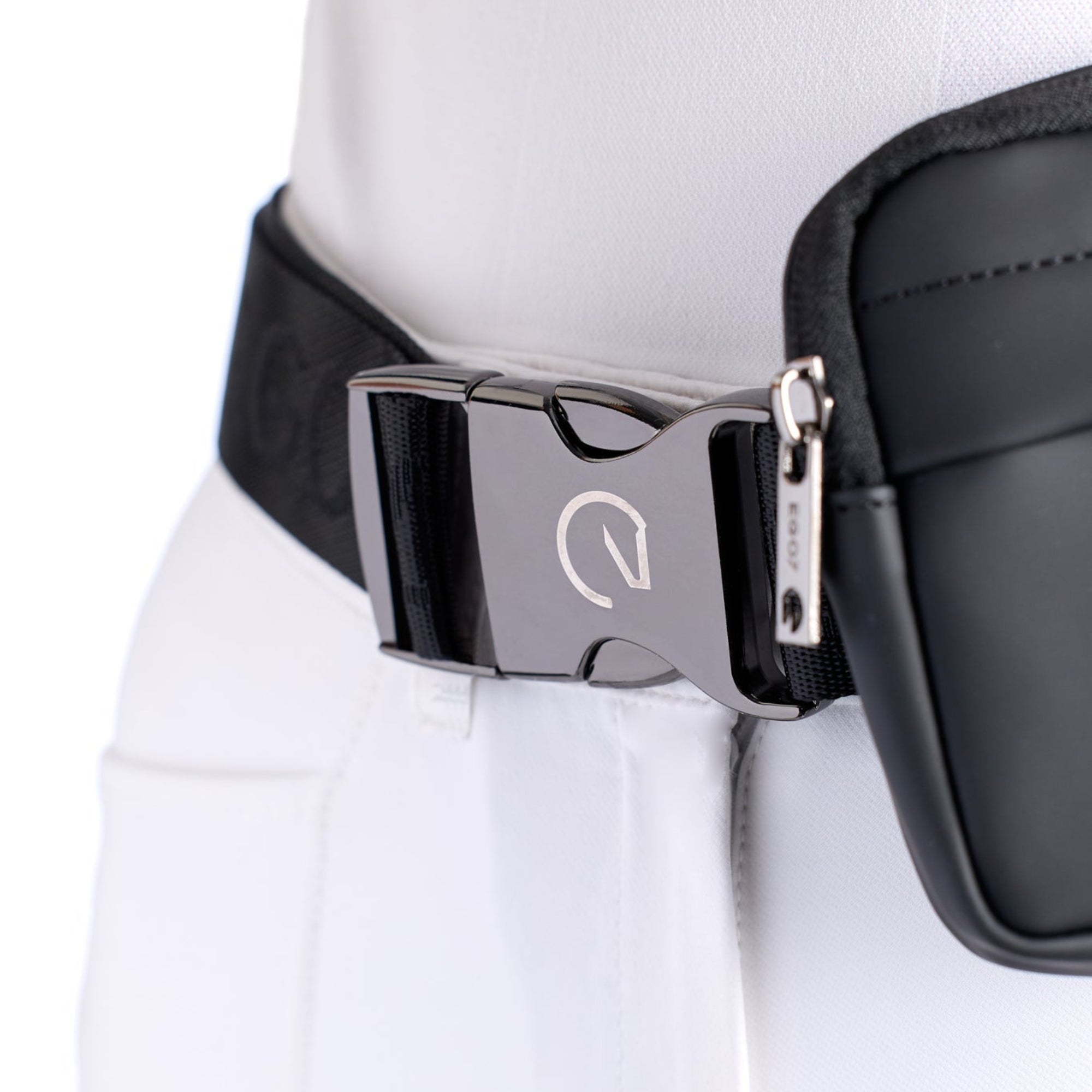 Close-up of the metal quick-release buckle with engraved logo on the black EGO7 Agnes Pouch strap