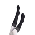 Black EGO7 MV riding socks displayed on mannequin legs against a plain white background