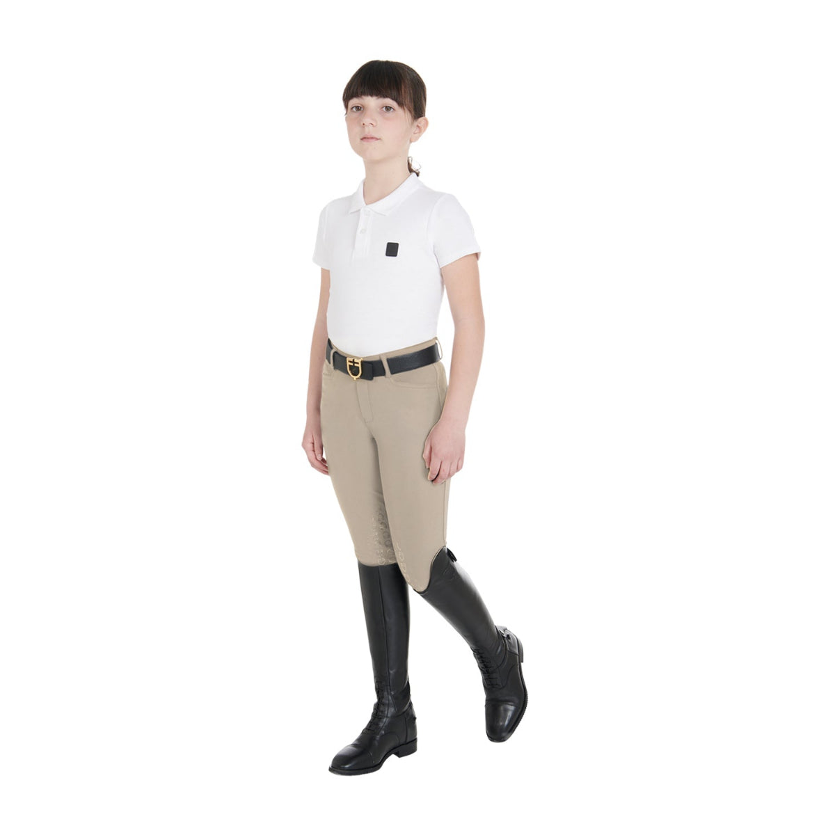 Equestro Amani Children's Competition Breeches - Oxford Tan; shown on girl full body | Young Rider Apparel | Malvern Saddlery