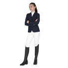 Equestro Children's Unisex Zip Competition Jacket - Navy Blazer; full body shown on young rider wearing white breeches, black riding boots on white background | Malvern Saddlery