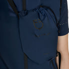 Equestro Women's Foldable Vest - Navy Blazer; close up of pouch over vest on model, white background | Riding Outerwear | Malvern Saddlery
