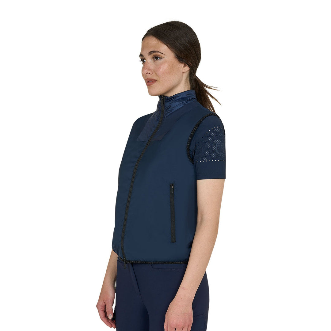 Equestro Women's Foldable Vest - Navy Blazer; on model, white background | Riding Outerwear | Malvern Saddlery