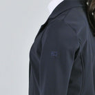 For Horses Winx Hunter Girls Show Jacket - Navy; close up left shoulder with logo shown on young rider  | Young Rider Competition Clothing | Malvern Saddlery