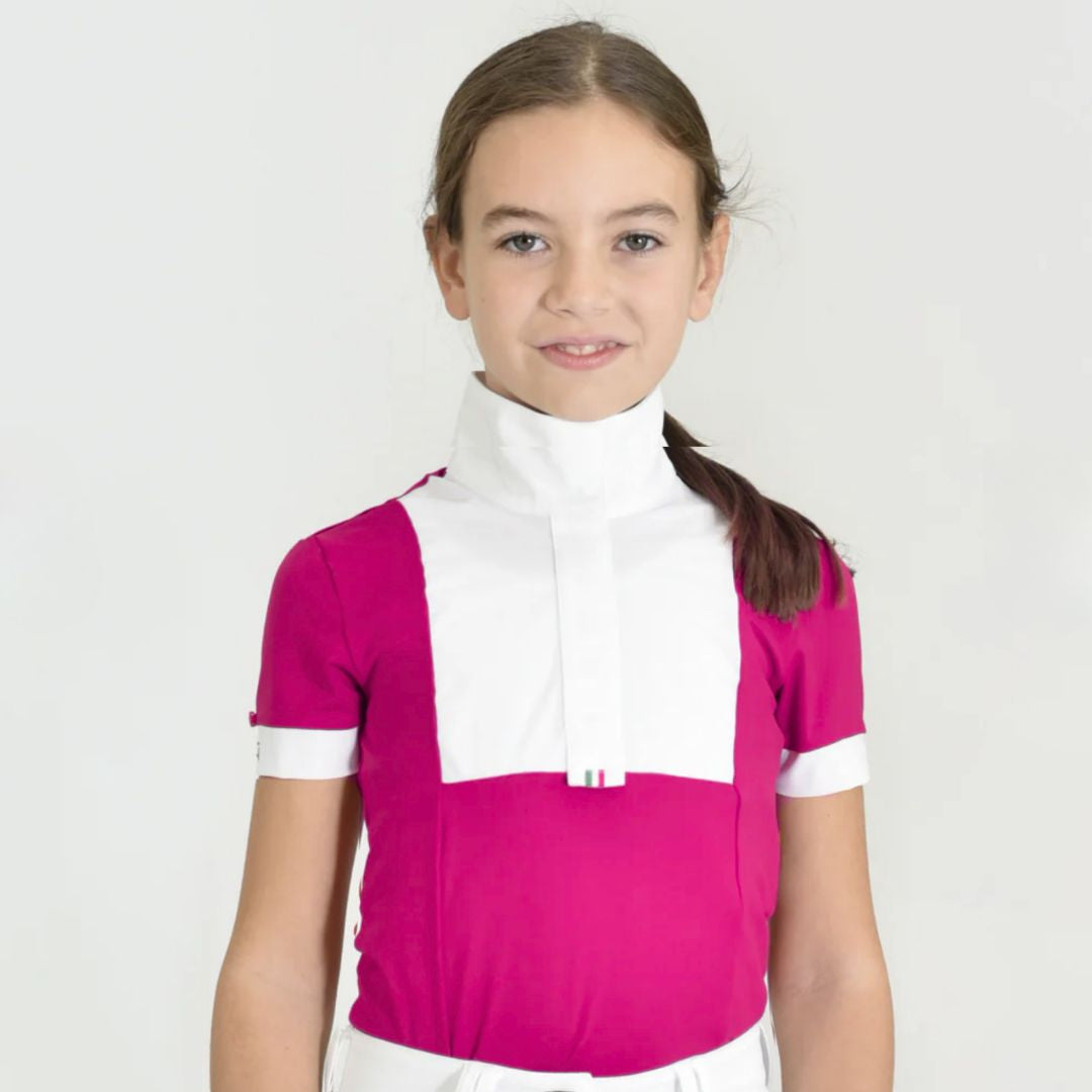 For Horses Ariel Short Sleeve Girls Show Shirt -Raspberry Pink - shown on young girl on gray background | Young Rider Competition Shirts | Malvern Saddlery
