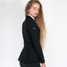 For Horses YAKIE Show Jacket - Black | Competition Riding Apparel; side view shown on woman on gray background | Malvern Saddlery