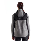 Back view of the EGO7 Skye women's waterproof equestrian jacket in melange grey featuring a discreet back ventilation opening.