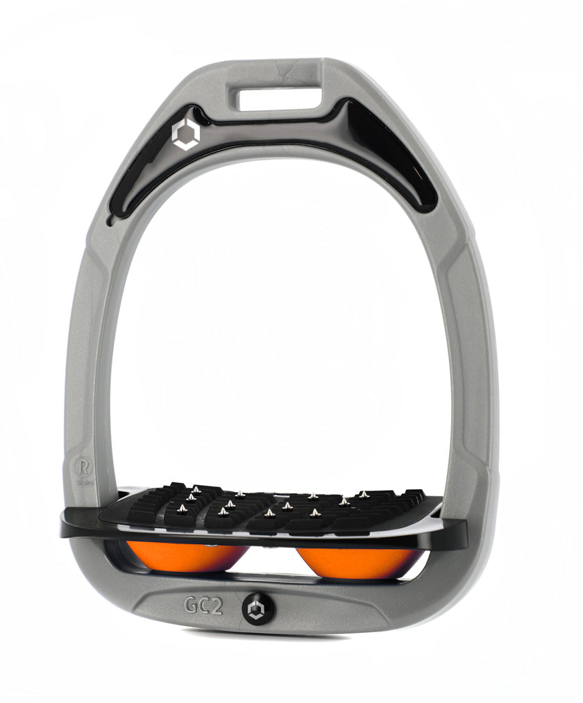 Flex-On Composite Equestrian Stirrups - Gray - with Black Inclined Ultra Grip Footbed; orange shock absorbers | Malvern Saddlery