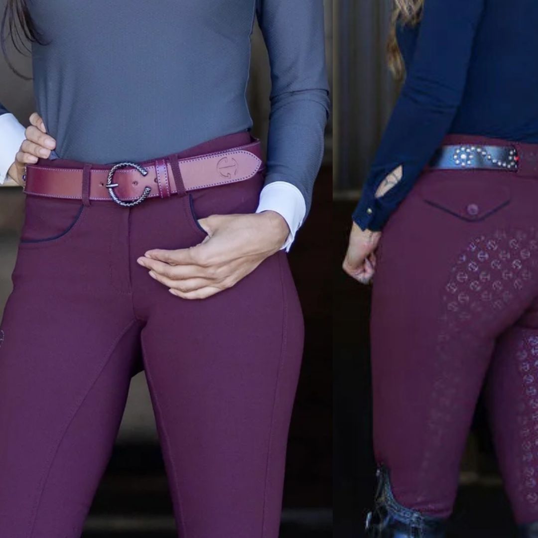 Halter Ego Evolution Ladies Mid Rise Full Grip Breeches - Merlot with Dark Blue piping & logo, shown on 2 women in barn close up of pockets | Malvern Saddlery