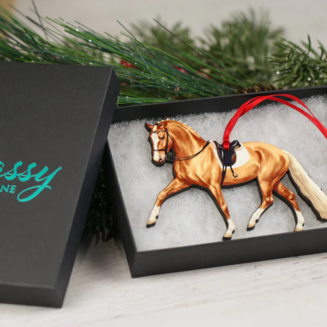 Half Pass Dressage Horse Ornament - Palomino; shown in gift box set on pine needles | Equestrian Gifts | Malvern Saddlery