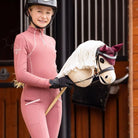LeMieux Hobby Horse - "Popcorn" - shown with young rider next to stables | Equestrian Toys | Malvern Saddlery