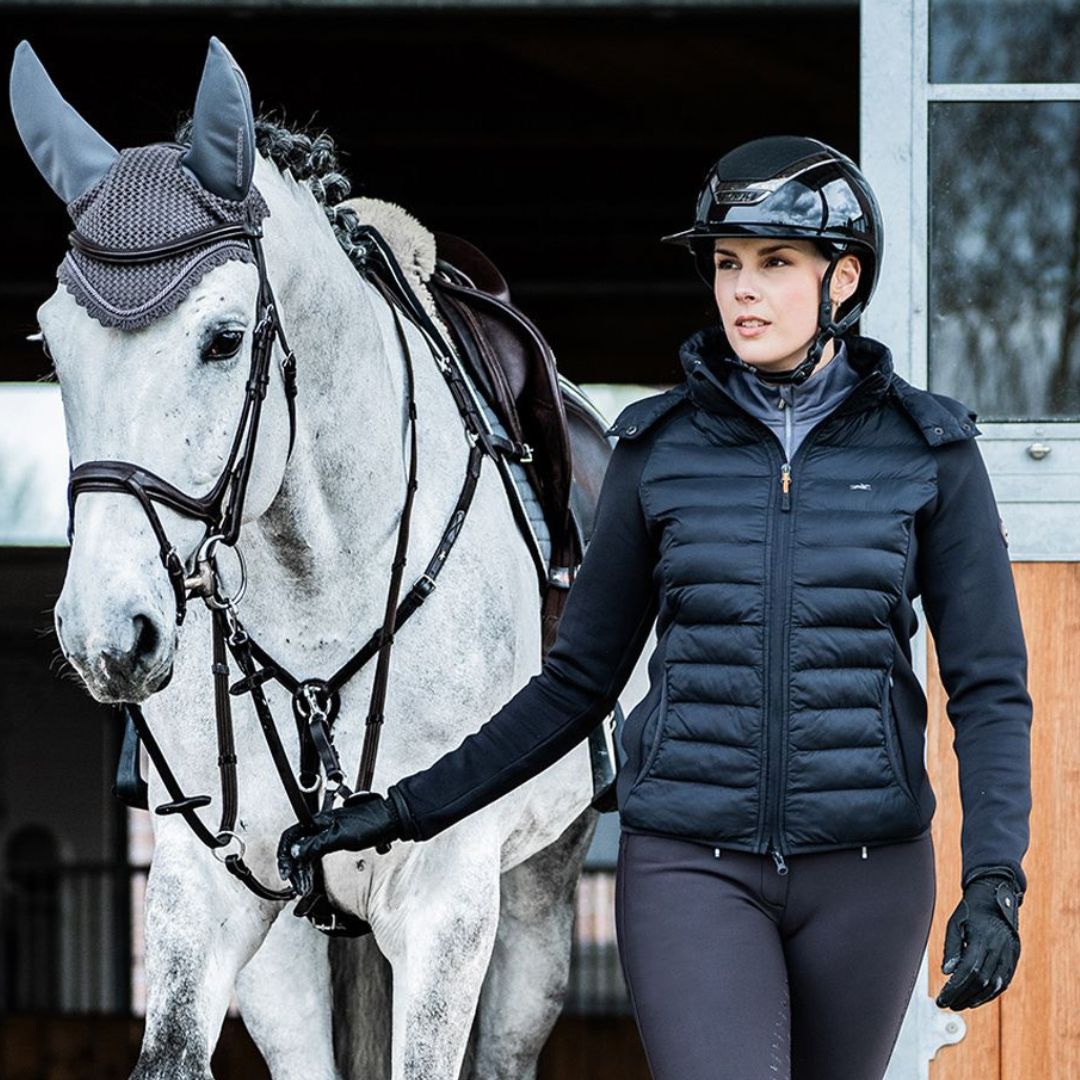 Schockemöhle Hybrid Jacket SPDarling - Deep Night, lifestyle image shown on rider with dappled gray horse | Malvern Saddlery