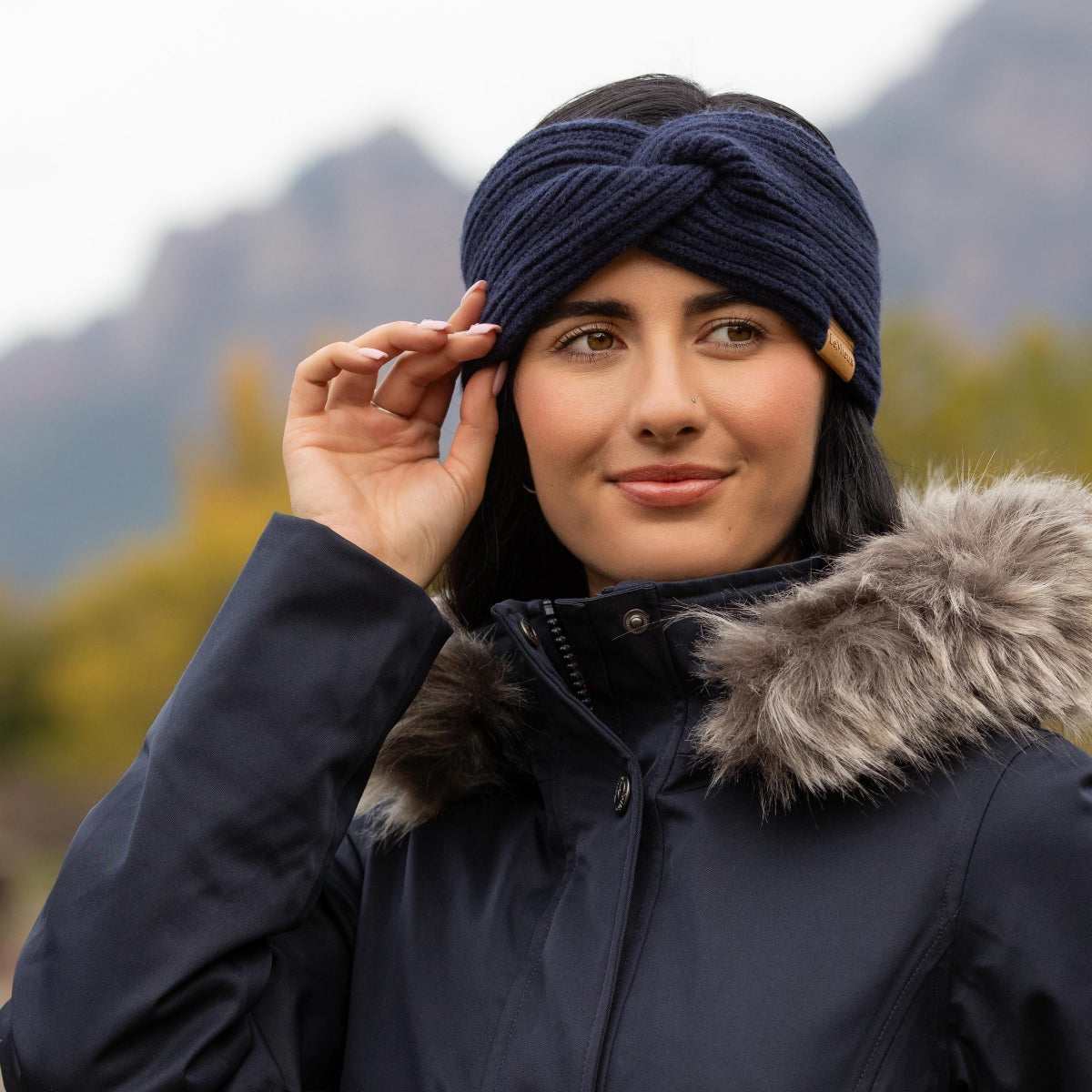 LeMieux Clara Rib Headband - Navy, on woman wearing coat outdoors | Cold Weather Shop | Malvern Saddlery