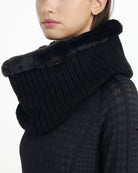LeMieux Aspen Snood - Black; close up shown on woman against white background | Hats, Gloves & Scarves | Malvern Saddlery