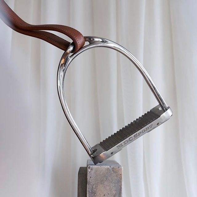 MDC Stirrup silver, shown tilted on block with brown stirrup leather | Malvern Saddlery
