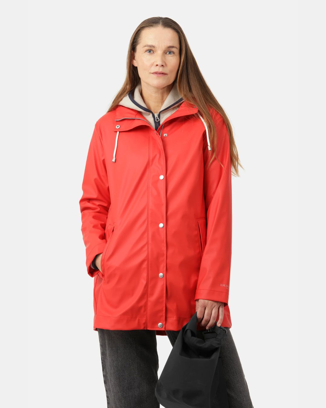 Ilse Jacobsen Spring-Summer Raincoat - Coral, shown on model | Women's Outerwear | Malvern Saddlery