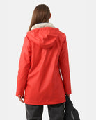 Ilse Jacobsen Spring-Summer Raincoat - Coral, back view on model | Women's Outerwear | Malvern Saddlery