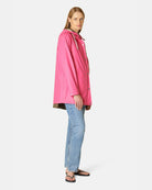 Ilse Jacobsen Spring-Summer Raincoat - Magenta, shown on model full length | Women's Outerwear | Malvern Saddlery