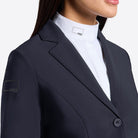 Rider's Gene Women's Jersey Competition Jacket - Navy; chest & neck close up - worn by woman wearing white breeches, black riding boots; shown on lt gray background | Women's Show Jackets | Malvern Saddlery