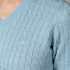 Schockemöhle Sports Womens' SP Pam Style Sweater - Light Blue; on model, close up chest logo | Malvern Saddlery
