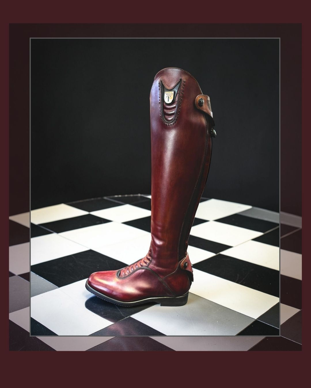 Tucci Harley Dress Boot - Custom Design - Wine w/black trim & crystal detail; shown on black & white checkered surface with black background | Equestrian Riding Boots | Malvern Saddlery