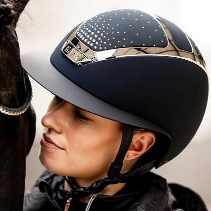 KASK Star Lady Chrome Passage Helmet in Navy shown on rider Charlotte Fry | Malvern Saddlery