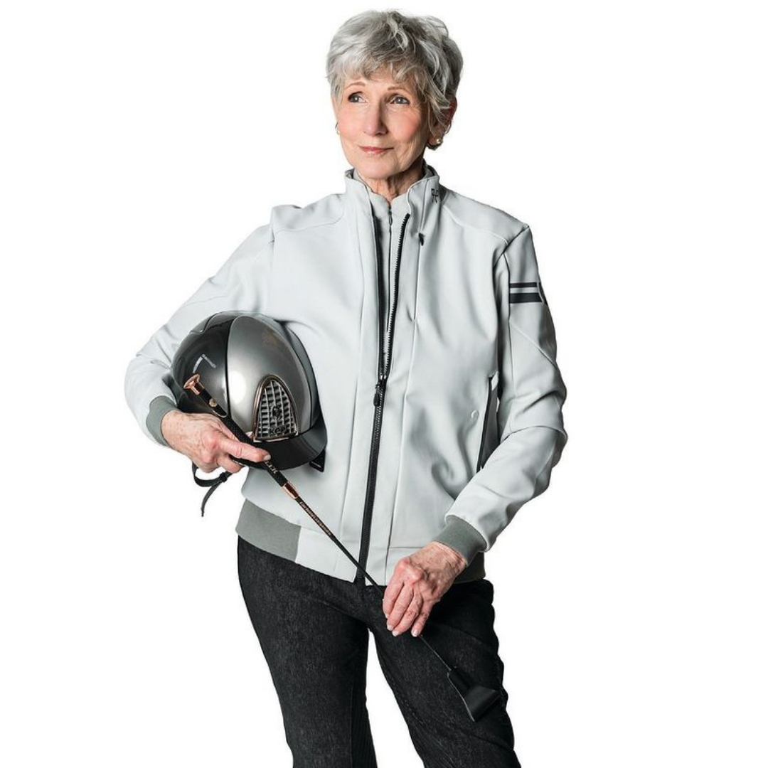 Jill in HP Bomber jacket holding kep helmet for Mainline Today magazine