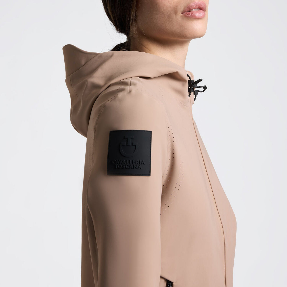 Cavalleria Toscana Women's Perforated Jersey Softshell Jacket - Brush [Beige]; close up side right arm logo patch | Ladies Riding Outerwear | Malvern Saddlery