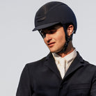 KASK Equestrian Dogma Hunter Helmet - Navy; shown on rider wearing show coat & tie | Malvern Saddlery