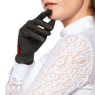 Rider wearing black EGO7 Air Gloves with white show shirt