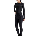 Side view of woman wearing EGO7 Audrey Women's Seamless Long Sleeve Training Shirt in Black