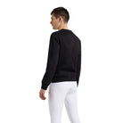 Back view of a man wearing the black EGO7 Dorian Men's Sweatshirt with white riding breeches