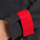 EGO7 Iris Women's Waterproof Jacket Black cuff and red EGO7 logo detail