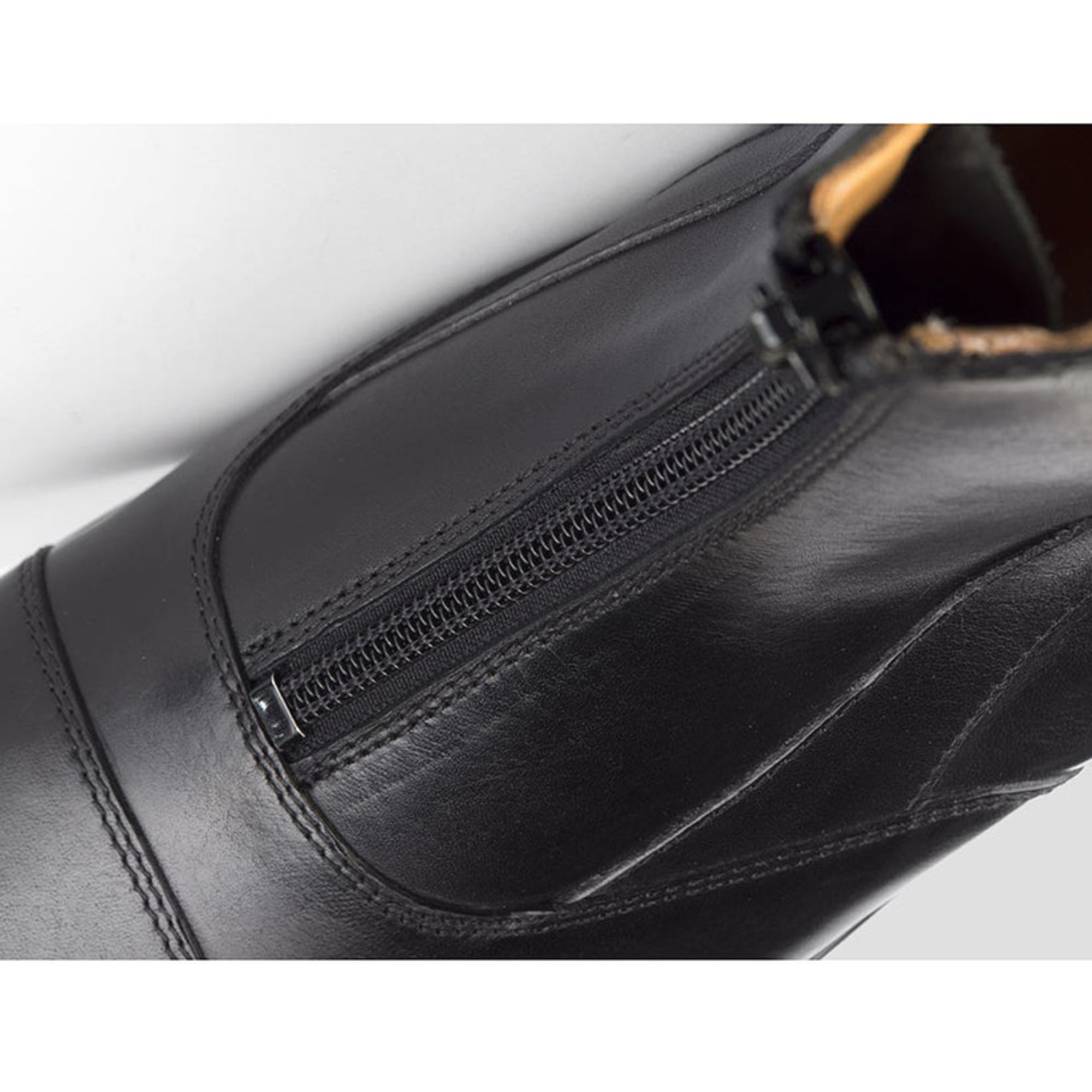 EGO7 Libra black leather equestrian riding paddock boot extreme close-up showing protective rear zipper closure and stitching