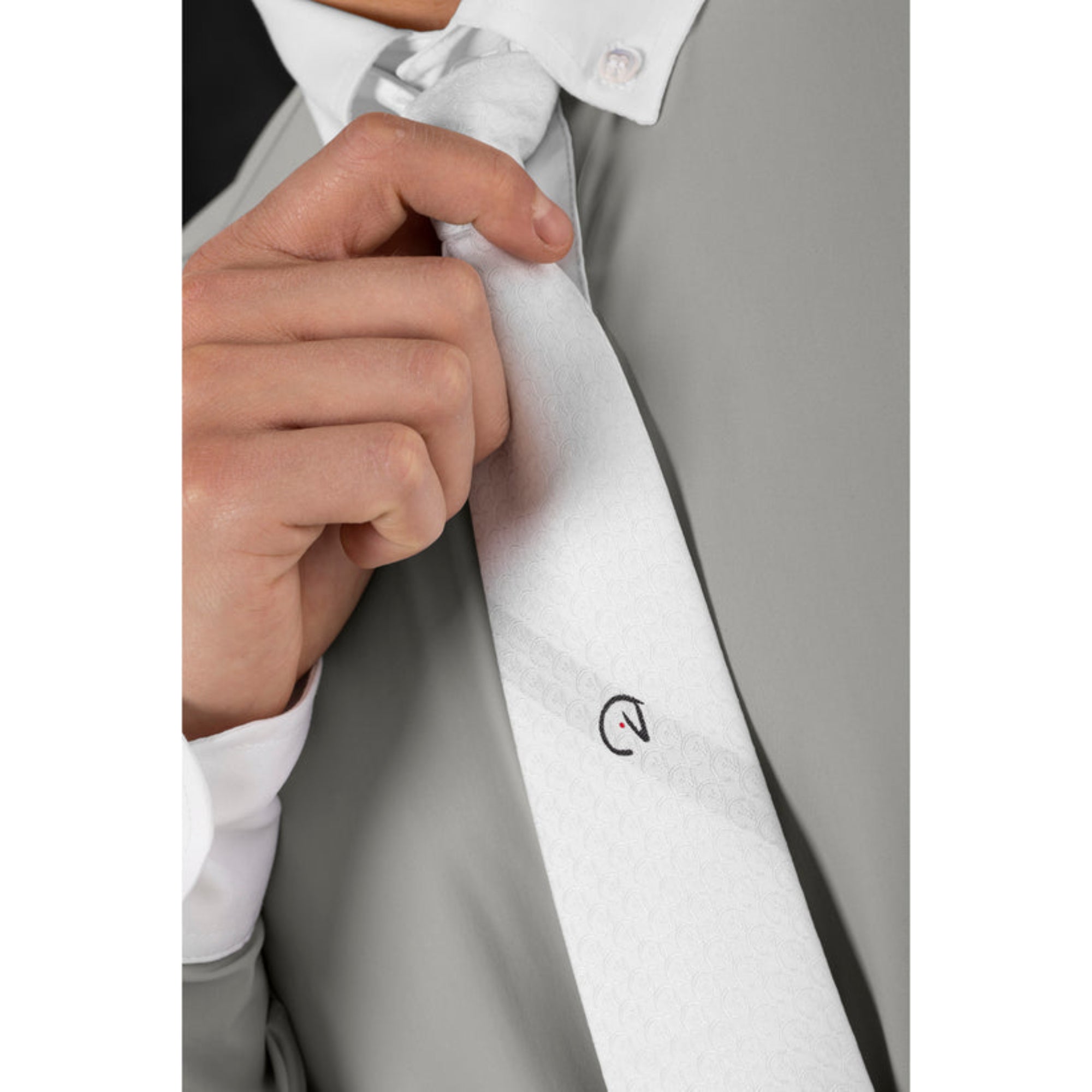 White EGO7 men's equestrian show tie featuring a jacquard horse head pattern and logo.