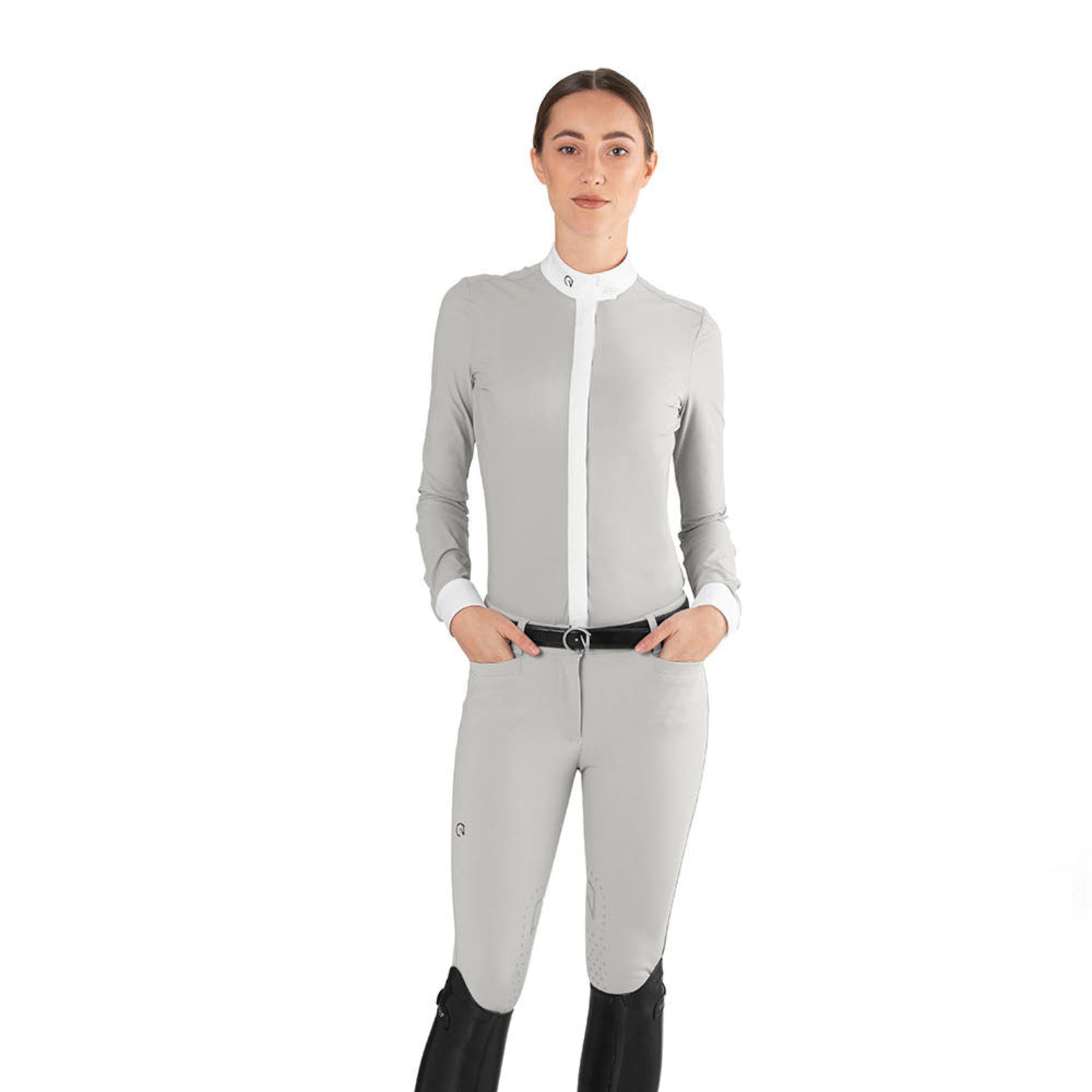 EGO7 Polo ML Women's Long Sleeve Show Shirt in Ice Grey with white collar and cuffs, paired with matching equestrian breeches and black riding boots.