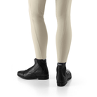 EGO7 Taurus black front-zip leather equestrian paddock boots worn with beige riding breeches, rear and profile view