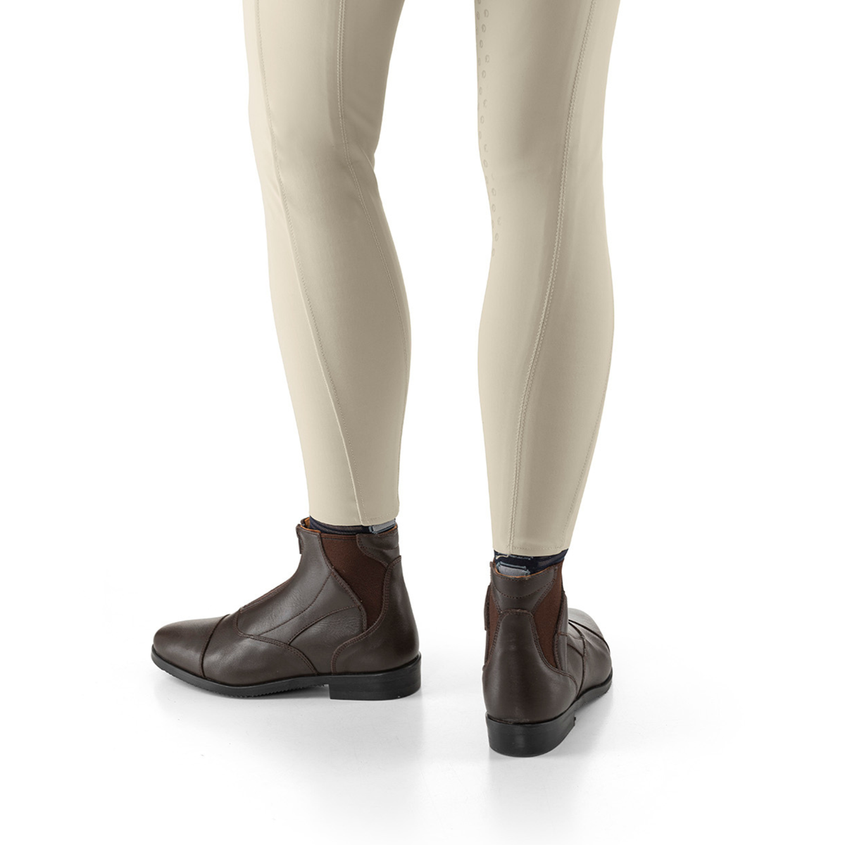 EGO7 Taurus brown front-zip leather equestrian paddock boots worn with beige riding breeches, rear and profile view