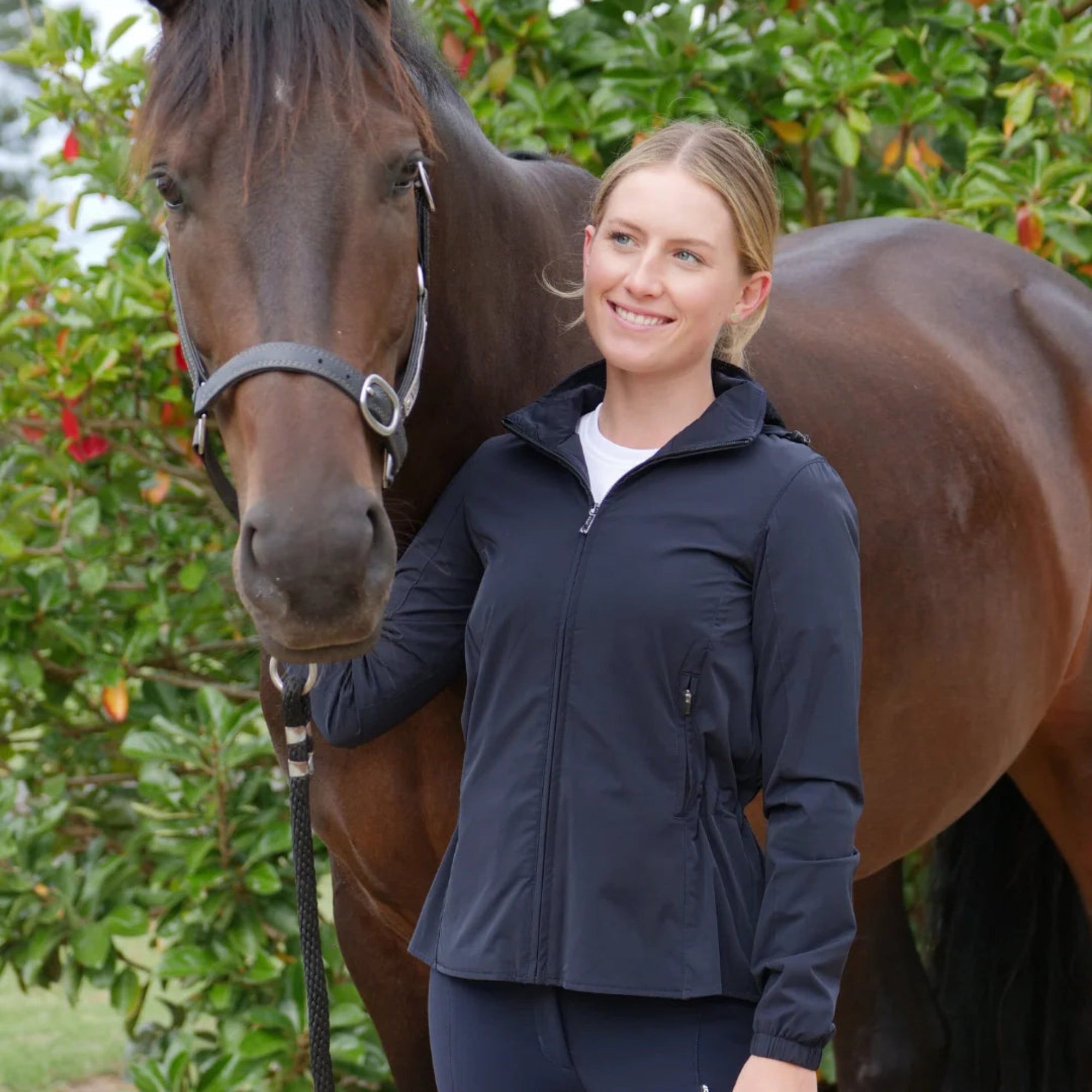EGO7 MV Wind Cheater Women's Jacket in Navy worn at the barn