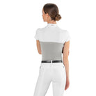 Back view of a female rider wearing the ice grey EGO7 Mesh Women's Short Sleeve Show Shirt with white mesh shoulders and stand-up collar