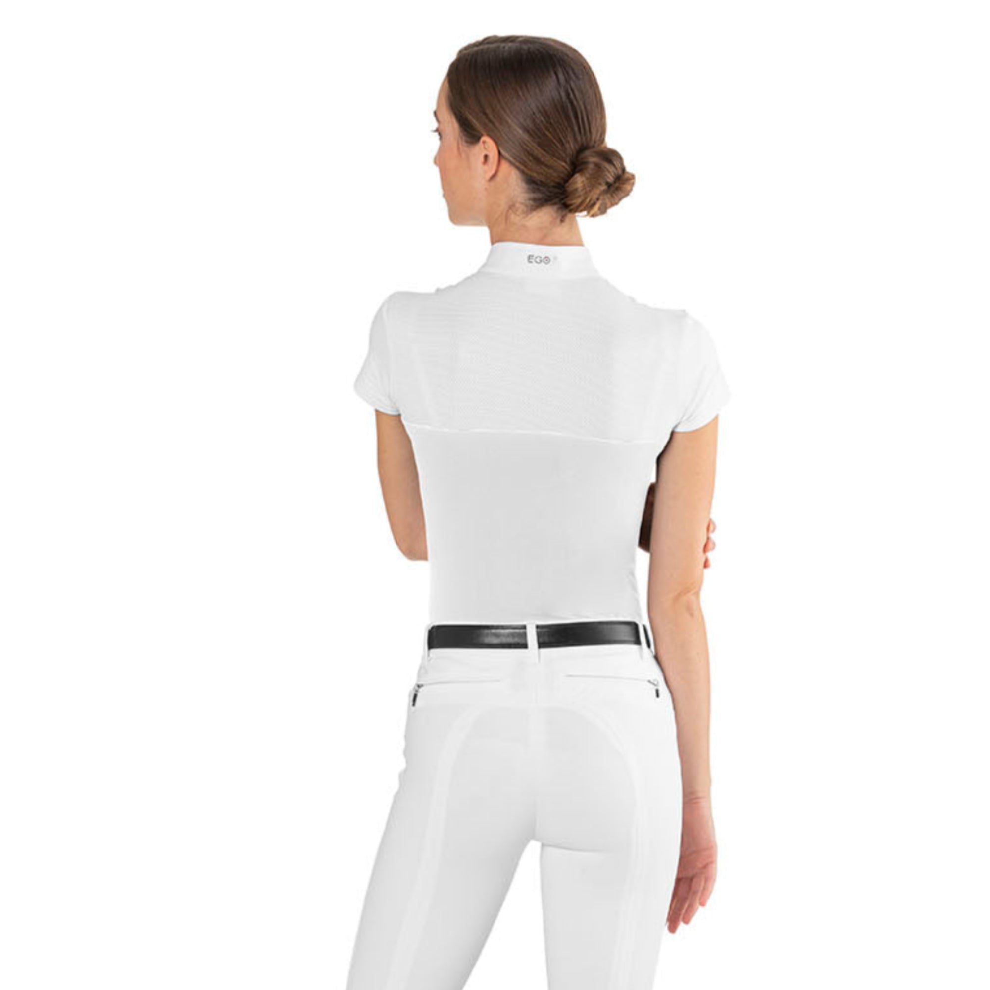 Back view of a female rider wearing the white EGO7 Mesh Women's Short Sleeve Show Shirt with stand-up collar detailing.