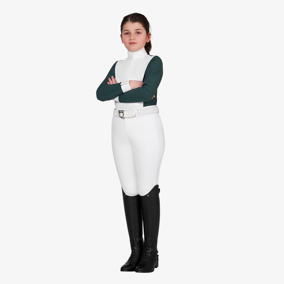 Equestro Girls' Long Sleeve Competition Polo in Pine Grove worn with breeches and tall boots
