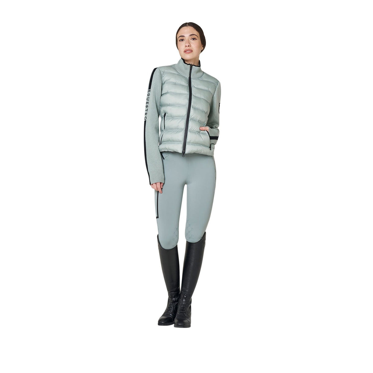 Equestro Hybrid Knit Jacket in Slate Grey worn with breeches and tall boots