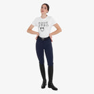 Equestro Women's Hunter Knee Grip Breeches - Navy, worn with tall boots | Malvern Saddlery