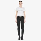 Equestro Women's Fleece-Lined Full Grip Breeches - Black, worn with tall boots | Malvern Saddlery