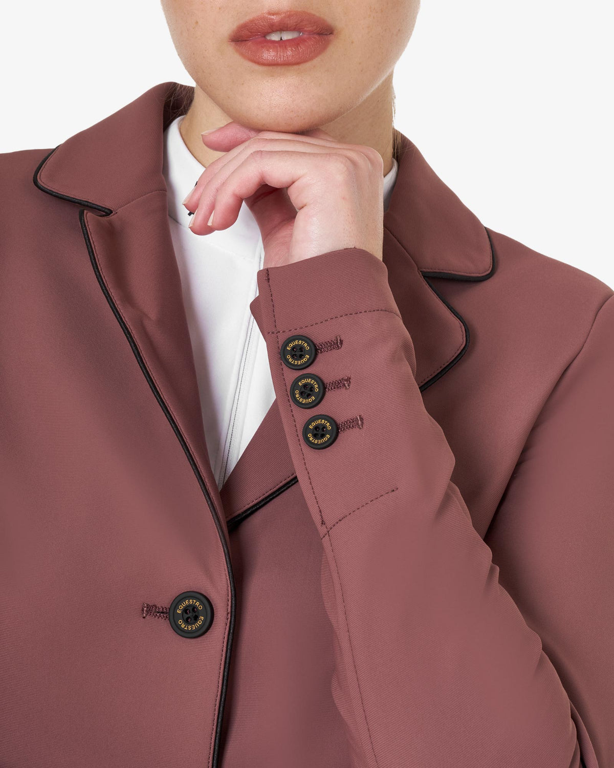 Equestro Women's Classic Show Coat - Maroon; close up of wrist buttons shown on woman on white background | Equestrian Competition Apparel| Malvern Saddlery