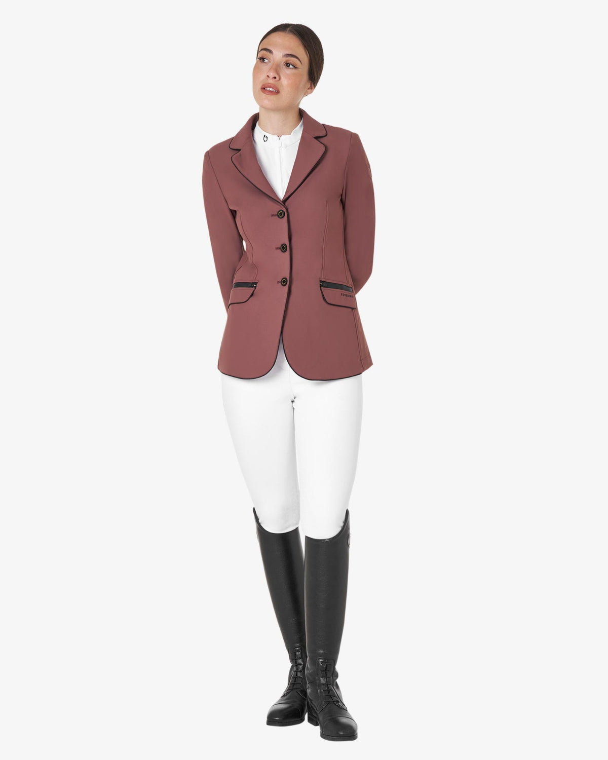 Equestro Women's Classic Show Coat - Maroon; shown on woman on white background wearing white breeches and riding boots | Equestrian Competition Apparel| Malvern Saddlery